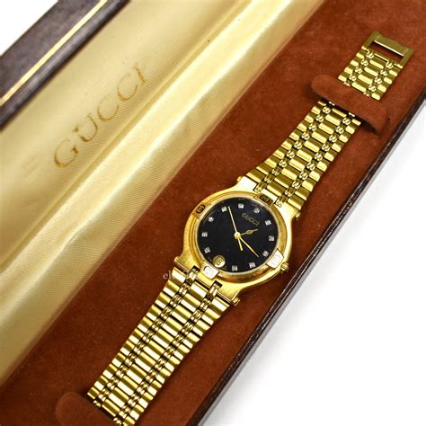 gucci 9200m gold watch